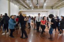 people dancing in a gallery