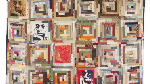 Multi square patchwork quilt featuring the face of James Baldwin in the blocks running from top left to bottom right