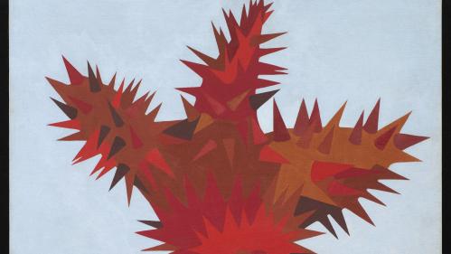 A red cactus or plant rises above a gray background.