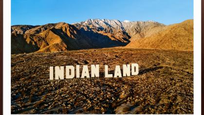 photo of mountains with the word INDIANLAND in the style of the Hollywood sign