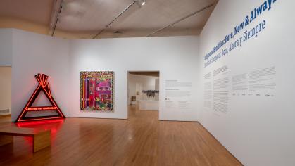 artwork in gallery with text on the right wall