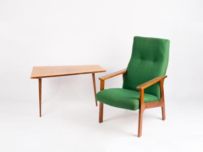 Green armchair with wooden arms and legs, and coordinating wooden side table