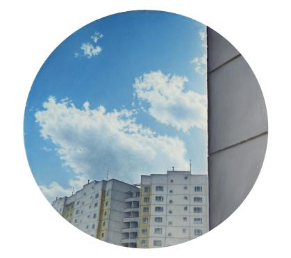Round painting of drab apartment buildings with blue sky and clouds visible; at right is closeup of one building wall