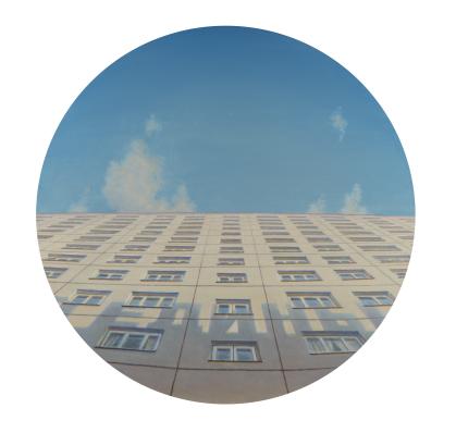 Round painting of large apartment building viewed at sharp angle from the ground with blue sky above