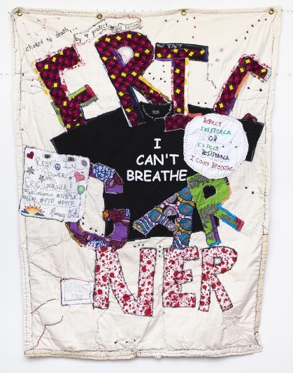 Quilt with Eric Garner in large patterned letters and a black t-shirt saying "I CAN'T BREATHE". 