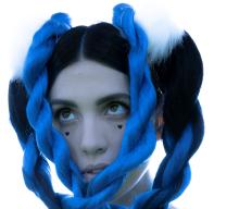 close up of white woman with blue braids