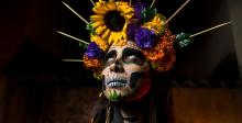 photo of woman in Dia de los Muertos costume