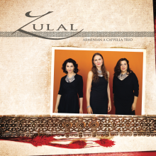 Graphic with decorative textile background and tiling pattern stripe. Top text reads Zulal, the name of the band. A photo in the middle of the graphic shows three women in black dresses posing stoically in front of an orange back drop.